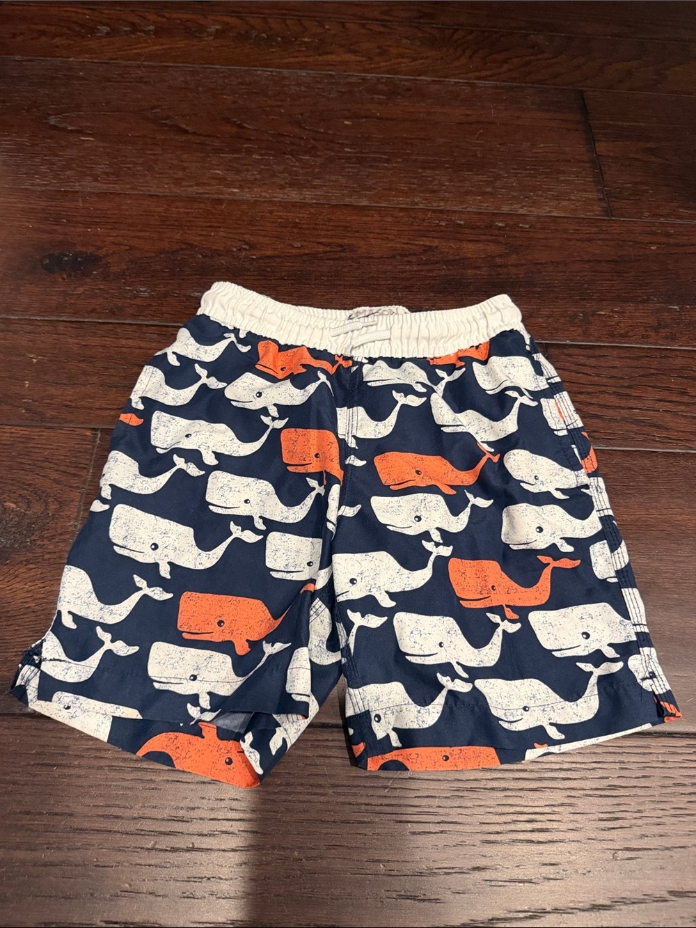 Kids Navy Whale Swim Shorts with Orange and White Print
